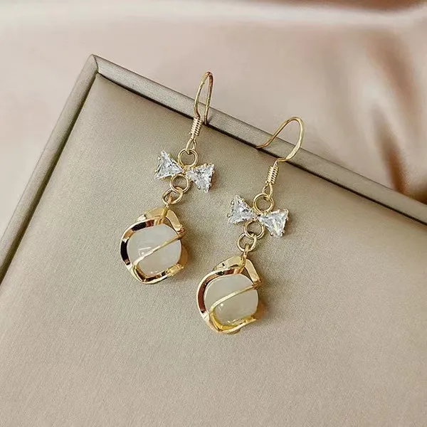 Σκουλαρίκια "ΝΕΡΑΙΔΕΣ" Ασημένια με Ζιργκόν και Πέτρα "Μάτι της Γάτας" σε ρομαντικό Σχέδιο με φιογκάκια