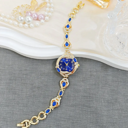 Ρολόι κόσμημα "Gold Blue Glamour" μεταλλικό κράμα με χρυσαφί φινίρισμα